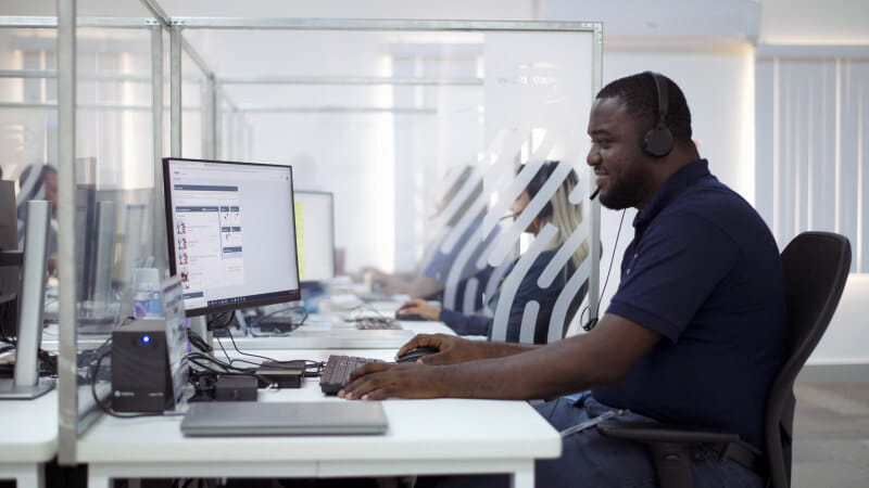 Guyana Georgetown Response Centre - Male employee at desk